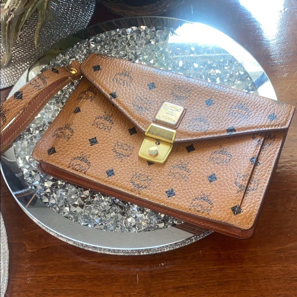 MCM Brown and Gold Clutch with Iconic Logo